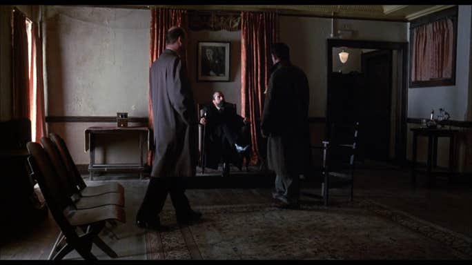 The first meeting between obviously satanic Lou Cyphre (Robert DeNiro) and Harold Angel (Mickey Rourke) while attorney Winesap (Dann Florek) looks on. When you agree to work for the devil and things go badly, really, who’s to blame?